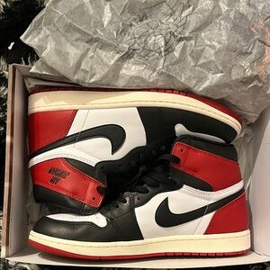 Jordan 1 Retro High OG (BLACK TOE REIMAGINED)one shoe is size 10 the other 10.5